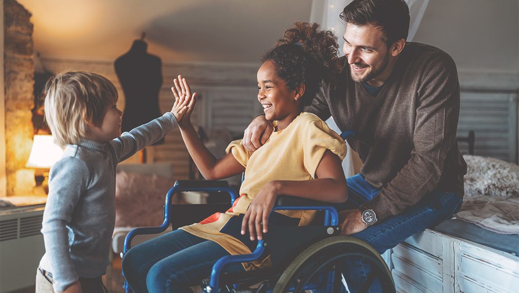 young girl in a wheelchair